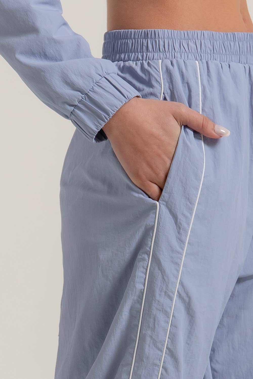 Anorak Fabric Side Piping Track Pants with Opening Stopper